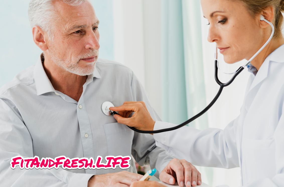 A doctor is checking blood pressure of an old man